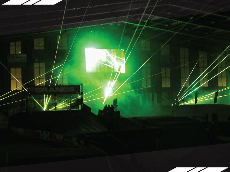 a photograph of a green light shining through a green light